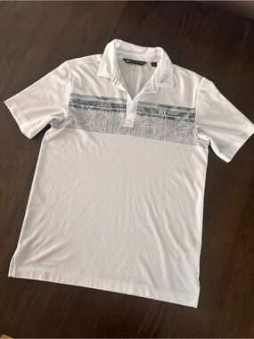 Travis Mathew White Polo with Grey Striped Chest Panel